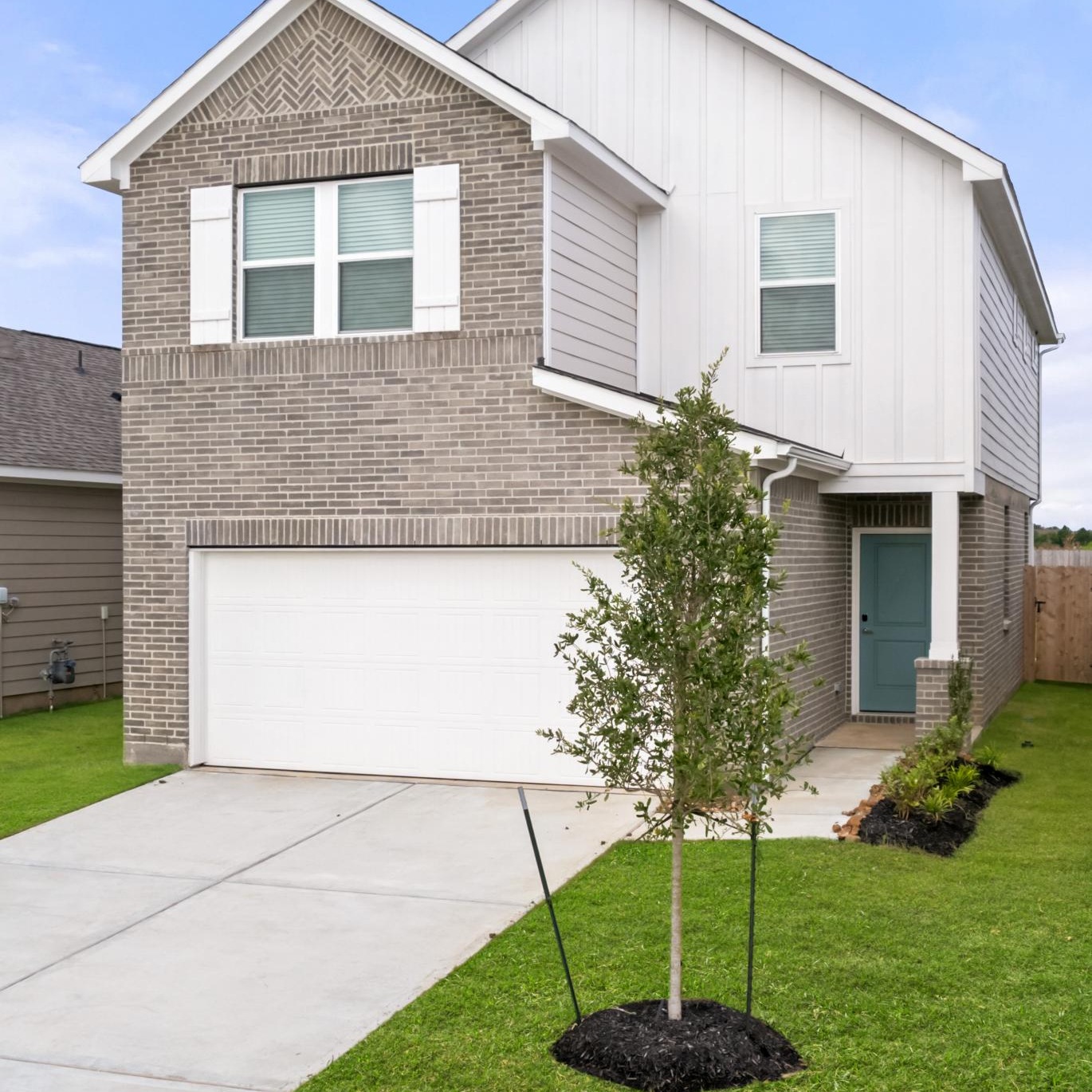 townhouse with enclosed garage